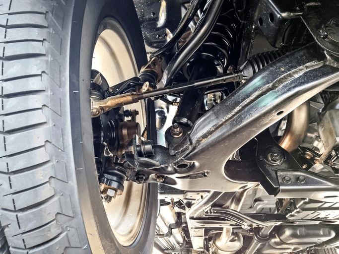 The steering and suspension components of a vehicle
