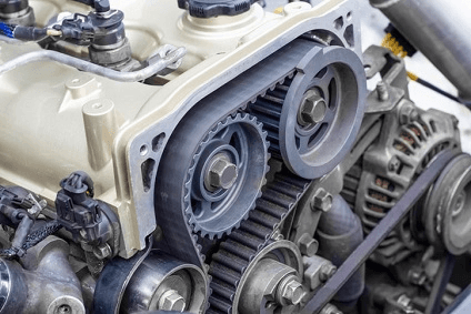 The timing belt inside the engine of a vehicle